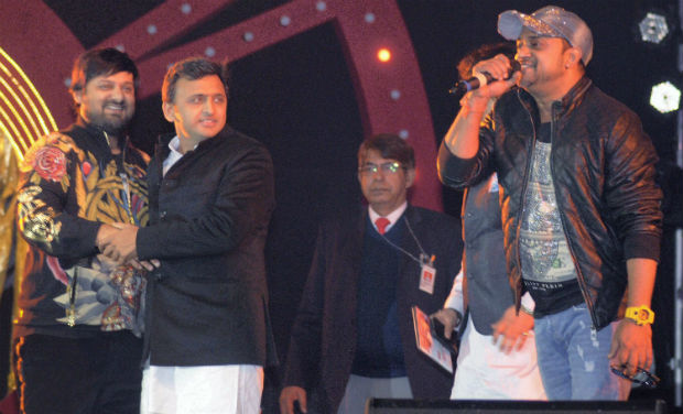 UP CM Akhilesh Yadav with music composers Sajid and Wajid at Saifai Mahotsav in Etawah district on Wednesday night - PTI UP CM Akhilesh Yadav with music composers Sajid and Wajid at Saifai Mahotsav in Etawah district on Wednesday night - PTI